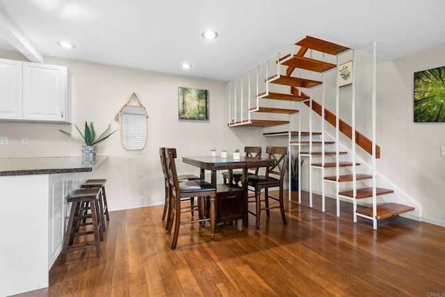 dining area with recessed lighting, stairway, baseboards, and dark wood-style floors