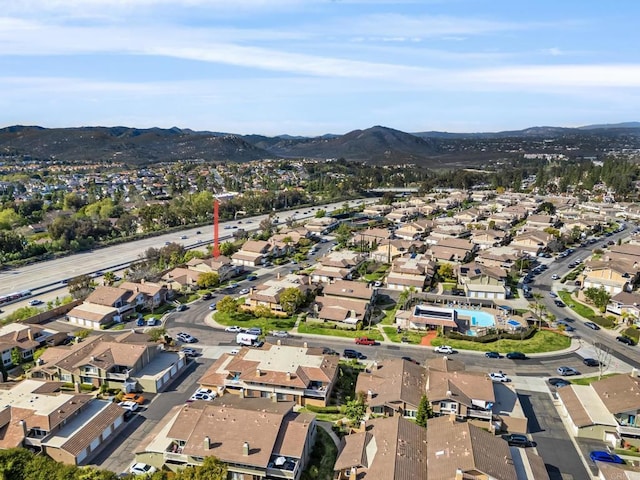 bird's eye view featuring a mountain view and a residential view