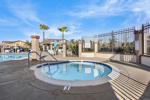 17438 Ashburton Rd, Rancho Bernardo San Diego, CA 92128 - community pool featuring a patio area and a community hot tub