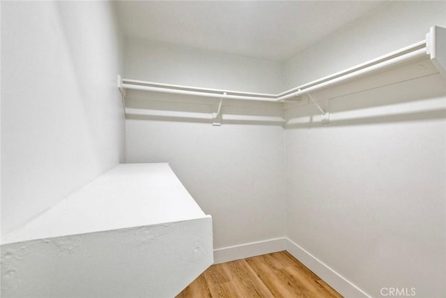 5166 Via Portola, Oceanside, CA 92057 - spacious closet with wood finished floors