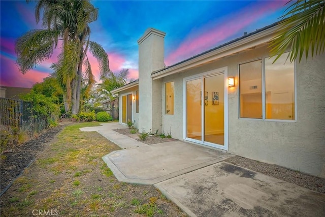 5166 Via Portola, Oceanside, CA 92057 - yard at dusk featuring a patio area and fence