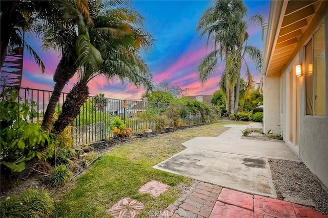 5166 Via Portola, Oceanside, CA 92057 - yard at dusk with a patio