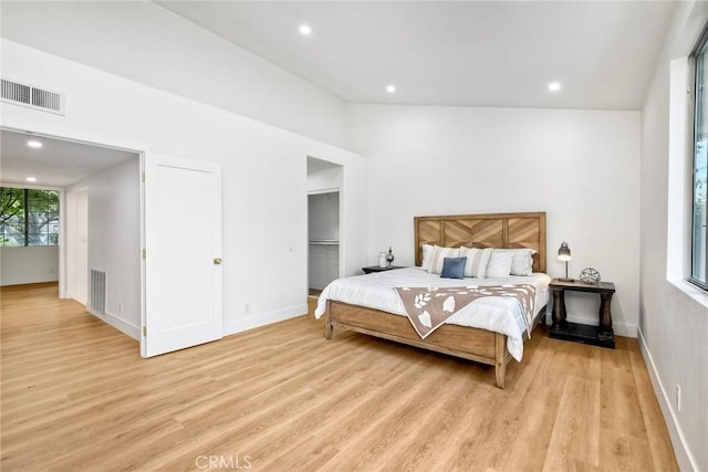 5166 Via Portola, Oceanside, CA 92057 - bedroom with light wood-style floors, baseboards, recessed lighting, and a spacious closet