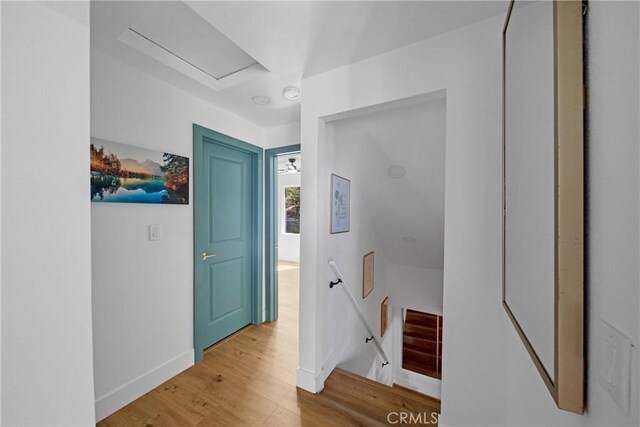 22384 Crest Forest Dr, Cedarpines Park, CA 92322 - hall featuring light wood-style flooring, an upstairs landing, and baseboards