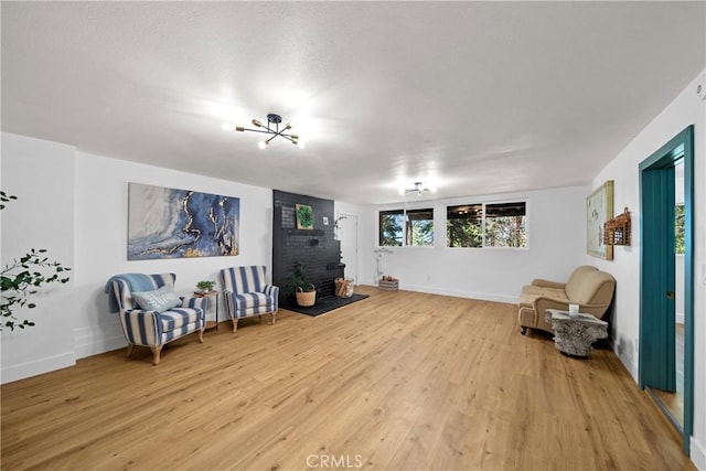 22384 Crest Forest Dr, Cedarpines Park, CA 92322 - living area featuring light wood-style flooring and baseboards