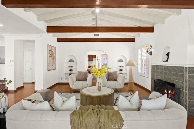 335 Montechico Dr, Monterey Park, CA 91754 - living room featuring wood finished floors, a tile fireplace, built in features, and baseboards