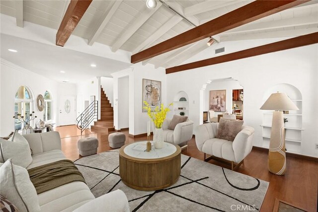 335 Montechico Dr, Monterey Park, CA 91754 - living area with wood finished floors, recessed lighting, stairs, arched walkways, and built in shelves