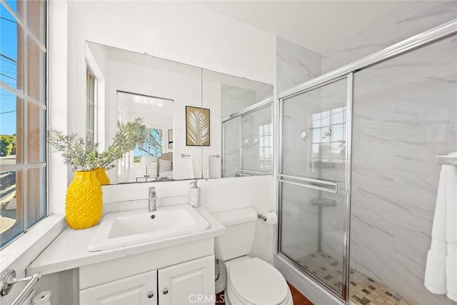 335 Montechico Dr, Monterey Park, CA 91754 - bathroom featuring a stall shower, toilet, and vanity