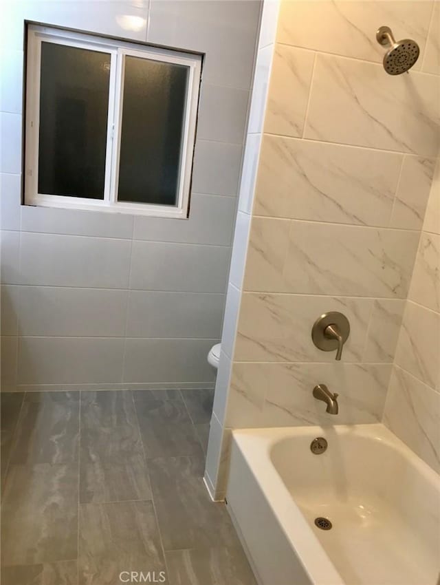 full bath with tub / shower combination and toilet