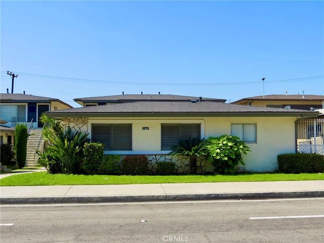 view of front of home with stucco siding