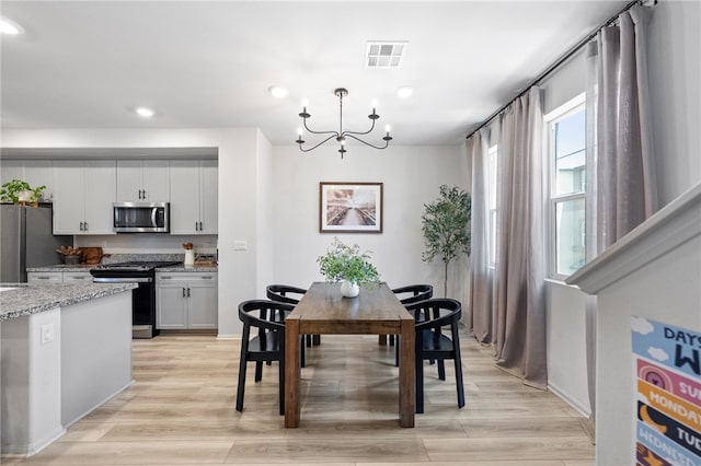 40545 Melrose Dr, Temecula, CA 92591 - dining space with a chandelier, recessed lighting, and light wood-type flooring
