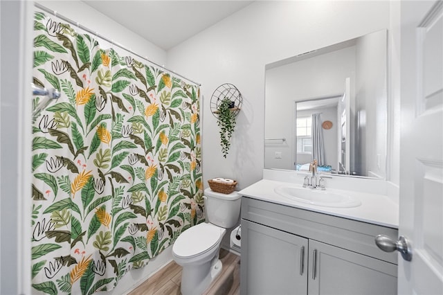 40545 Melrose Dr, Temecula, CA 92591 - bathroom with vanity, toilet, a shower with shower curtain, and wood finished floors