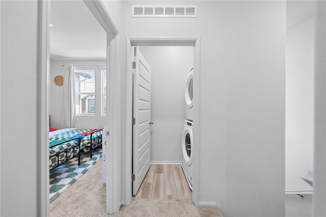 40545 Melrose Dr, Temecula, CA 92591 - washroom with estacked washer and dryer and carpet