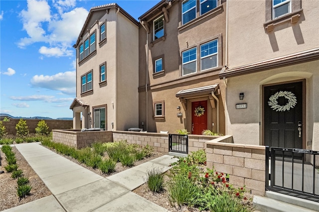 40545 Melrose Dr, Temecula, CA 92591 - property entrance with a gate and stucco siding