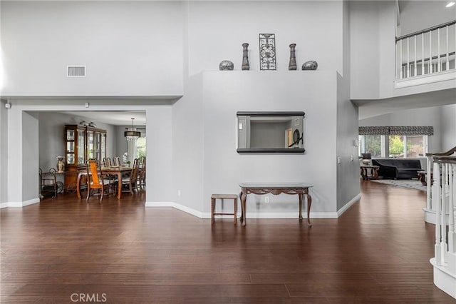 26426 Cardinal Dr, Canyon Country, CA 91387 - living area featuring a high ceiling, baseboards, and wood finished floors