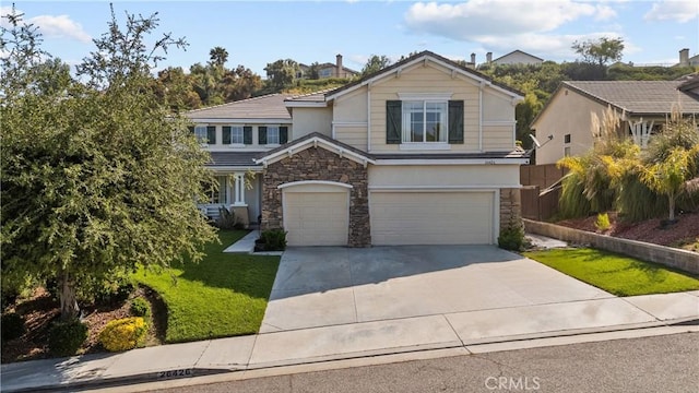 26426 Cardinal Dr, Canyon Country, CA 91387 - traditional home featuring stone siding, an attached garage, driveway, a front yard, and stucco siding
