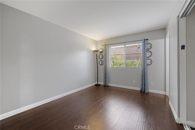 26426 Cardinal Dr, Canyon Country, CA 91387 - spare room with wood finished floors and baseboards