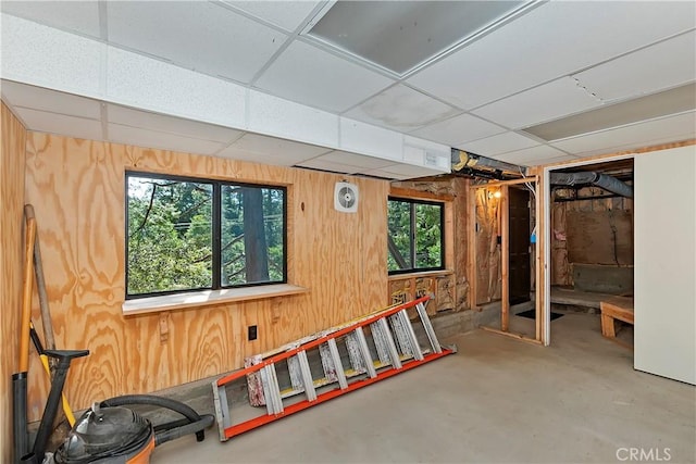 26638 Lake Forest Dr, Twin Peaks, CA 92391 - below grade area with plenty of natural light, wooden walls, and a drop ceiling