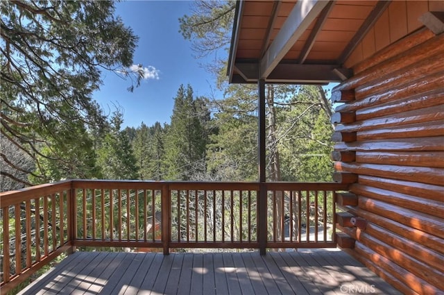 26638 Lake Forest Dr, Twin Peaks, CA 92391 - wooden terrace featuring a wooded view