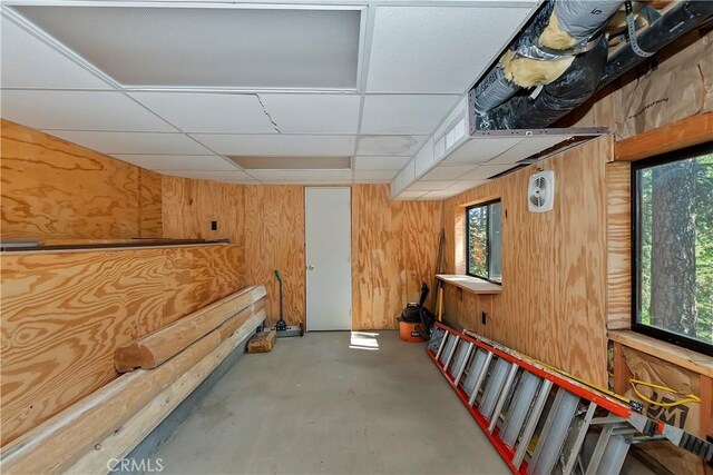 26638 Lake Forest Dr, Twin Peaks, CA 92391 - basement with wooden walls and a drop ceiling