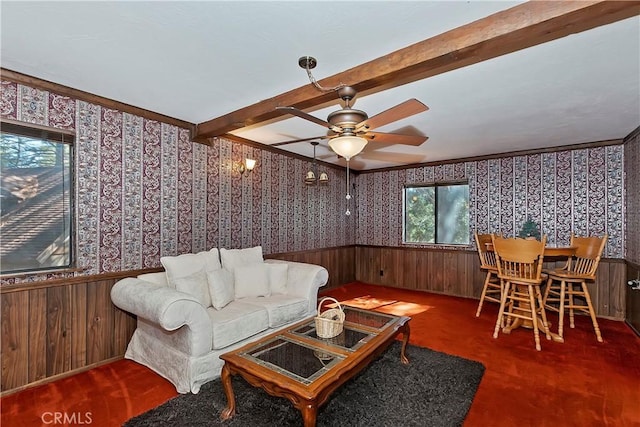 26638 Lake Forest Dr, Twin Peaks, CA 92391 - living area featuring wainscoting, wallpapered walls, ceiling fan, beamed ceiling, and wood walls