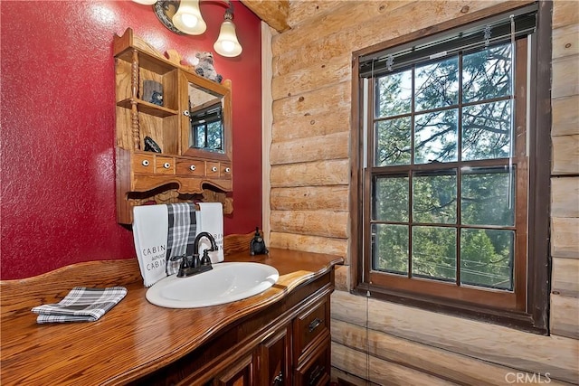 26638 Lake Forest Dr, Twin Peaks, CA 92391 - bathroom featuring rustic walls and vanity