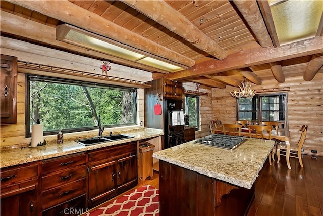 26638 Lake Forest Dr, Twin Peaks, CA 92391 - kitchen with a sink, stainless steel gas stovetop, dark wood-type flooring, a chandelier, and beam ceiling