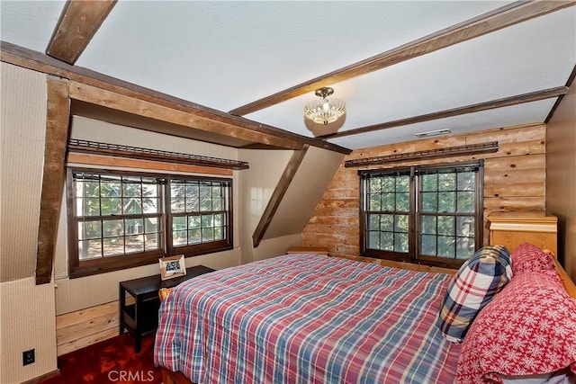 26638 Lake Forest Dr, Twin Peaks, CA 92391 - bedroom with beam ceiling, multiple windows, a chandelier, wood finished floors, and log walls