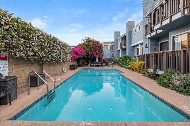 5100 Riverton Ave Unit 14, North Hollywood, CA 91601 - community pool with a residential view and fence