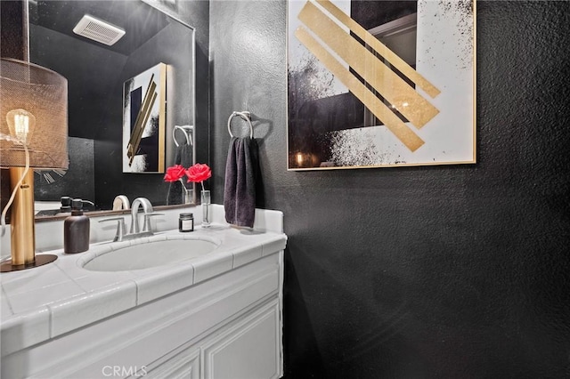 5100 Riverton Ave Unit 14, North Hollywood, CA 91601 - bathroom with a textured wall and vanity
