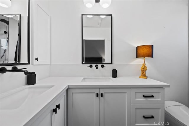 5100 Riverton Ave Unit 14, North Hollywood, CA 91601 - bathroom featuring double vanity and toilet