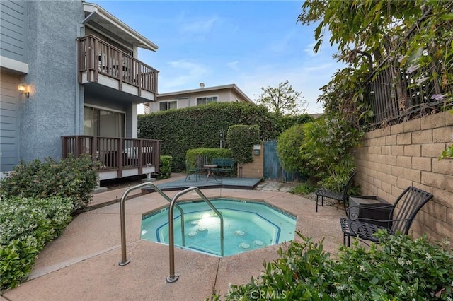 5100 Riverton Ave Unit 14, North Hollywood, CA 91601 - view of swimming pool with a community hot tub, a fenced backyard, and a patio