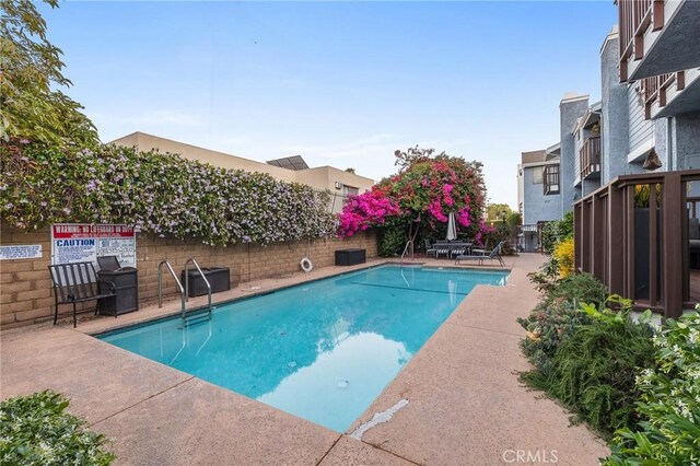 5100 Riverton Ave Unit 14, North Hollywood, CA 91601 - community pool featuring fence