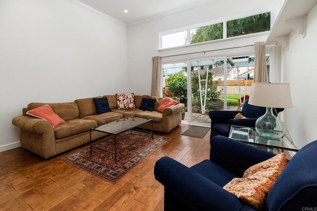 816 Caminito Azul, Carlsbad, CA 92011 - living area featuring crown molding, hardwood / wood-style floors, a towering ceiling, baseboards, and recessed lighting