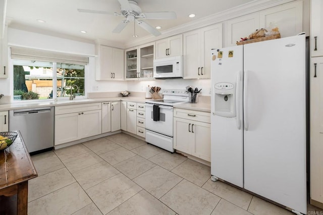 816 Caminito Azul, Carlsbad, CA 92011 - kitchen with white appliances, a sink, light countertops, white cabinetry, and recessed lighting