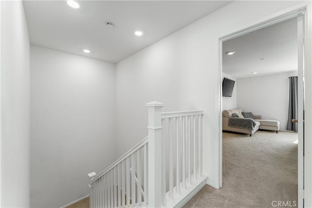 7155 Citrus Ave Unit 315, Fontana, CA 92336 - hallway with an upstairs landing, carpet, and recessed lighting