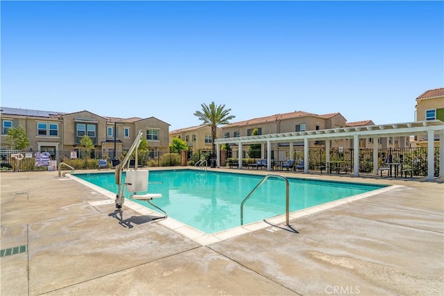 7155 Citrus Ave Unit 315, Fontana, CA 92336 - community pool with fence, a patio, a residential view, and a pergola
