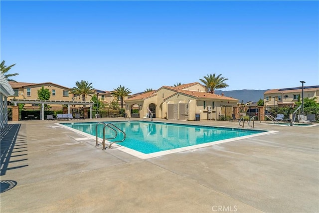 7155 Citrus Ave Unit 315, Fontana, CA 92336 - community pool with a patio, fence, and a mountain view