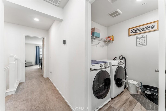 7155 Citrus Ave Unit 315, Fontana, CA 92336 - clothes washing area with washer and clothes dryer and light colored carpet
