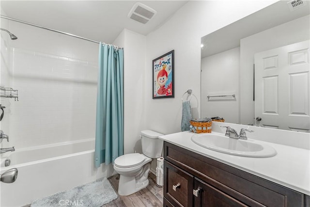 7155 Citrus Ave Unit 315, Fontana, CA 92336 - bathroom with toilet, wood finished floors, shower / bath combination with curtain, and vanity