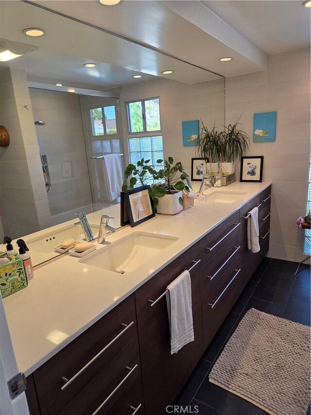 28715 Crestridge Rd, Rancho Palos Verdes, CA 90275 - full bathroom with double vanity, tile patterned floors, an enclosed shower, recessed lighting, and tile walls