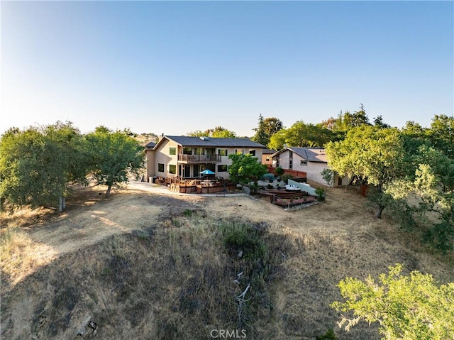 5145 Northfork Pl, Paso Robles, CA 93446 - rear view of house with a deck and a garden