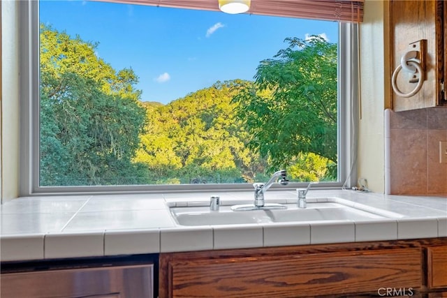 5145 Northfork Pl, Paso Robles, CA 93446 - kitchen featuring a sink, tile countertops, and healthy amount of natural light
