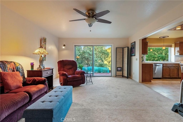 5145 Northfork Pl, Paso Robles, CA 93446 - living room featuring light carpet, healthy amount of natural light, a ceiling fan, and baseboards