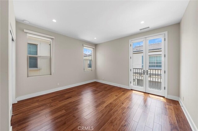 124 Trumpet Flower, Irvine, CA 92618 - unfurnished room with wood finished floors, french doors, baseboards, and recessed lighting