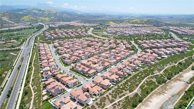 124 Trumpet Flower, Irvine, CA 92618 - view of property location featuring nearby suburban area, a main thoroughfare, and mountains