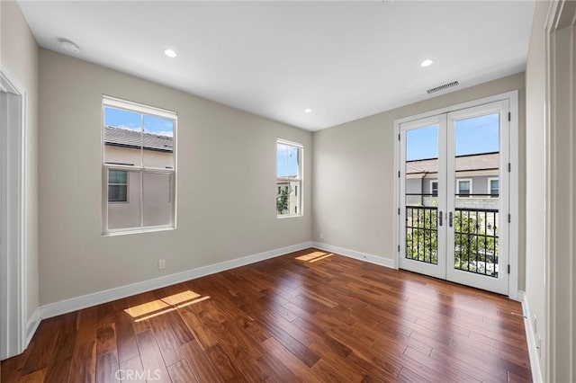 124 Trumpet Flower, Irvine, CA 92618 - empty room featuring french doors, baseboards, wood finished floors, recessed lighting, and a smoke detector
