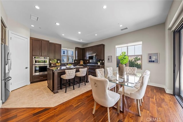 124 Trumpet Flower, Irvine, CA 92618 - dining space with recessed lighting, light wood finished floors, and baseboards