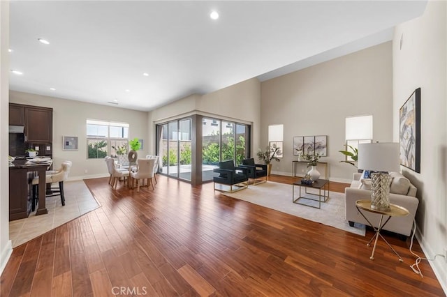 124 Trumpet Flower, Irvine, CA 92618 - living room with light wood-type flooring, baseboards, and recessed lighting