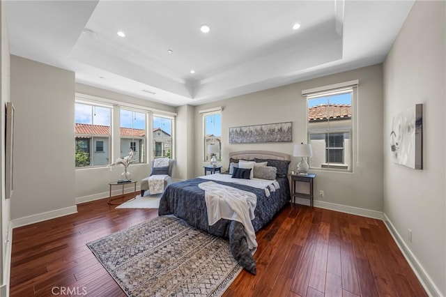 124 Trumpet Flower, Irvine, CA 92618 - bedroom featuring a tray ceiling, hardwood / wood-style flooring, baseboards, and recessed lighting